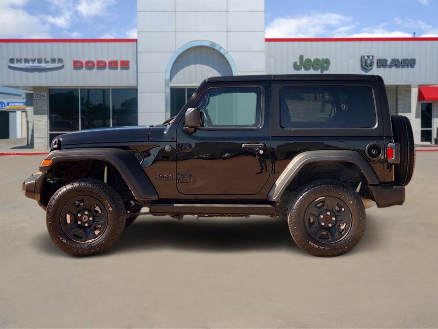 2025 Jeep Wrangler — rear three-quarter view