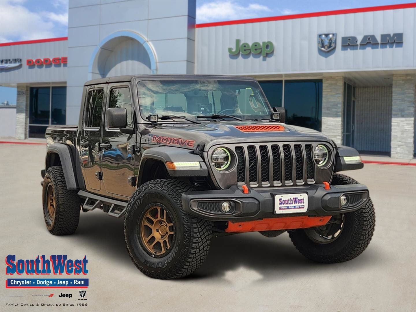 2021 Jeep Gladiator Mojave 4x4 in Granite Crystal Metallic Clearcoat — front three-quarter view