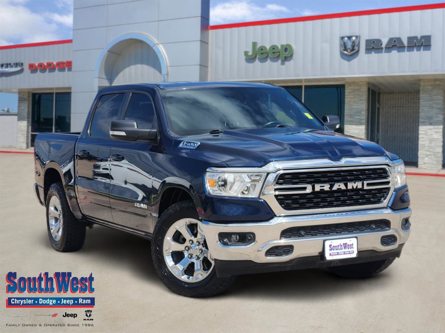 2022 RAM Ram 1500 Lone Star Crew Cab 4x4 5'7' Box in Patriot Blue Pearlcoat — front three-quarter view
