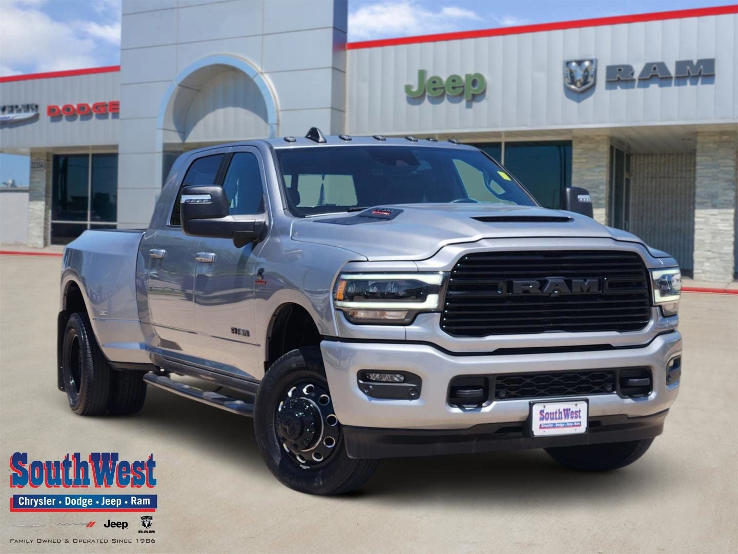 2024 RAM Ram 3500 Laramie Mega Cab 4x4 6'4' Box in Billet Silver Metallic Clearcoat — front three-quarter view