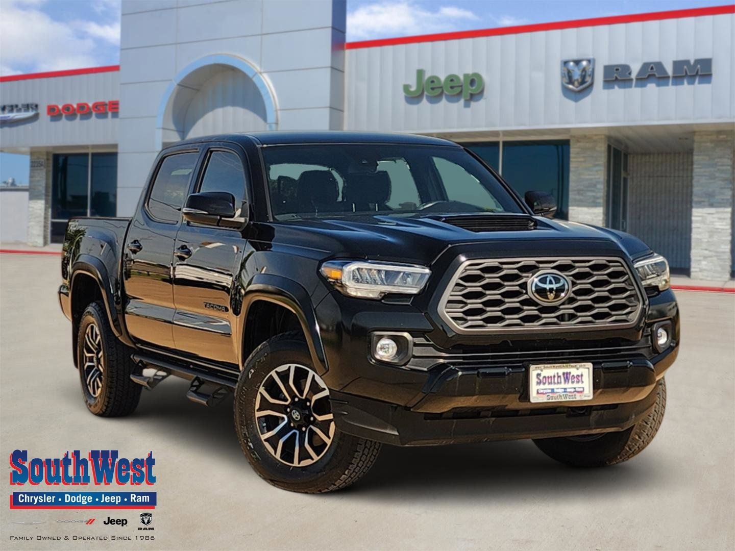 2023 Toyota Tacoma TRD Sport in Black — front three-quarter view