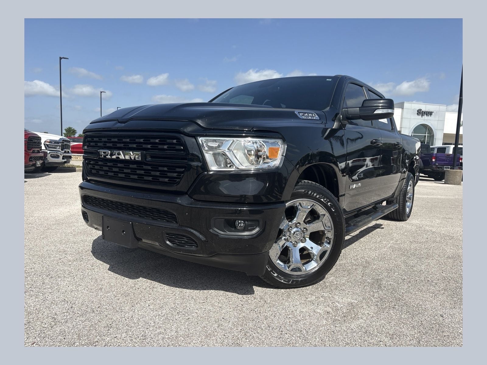2022 RAM Ram 1500 Lone Star Crew Cab 4x2 5'7' Box in Diamond Black Crystal Pearlcoat — front three-quarter view