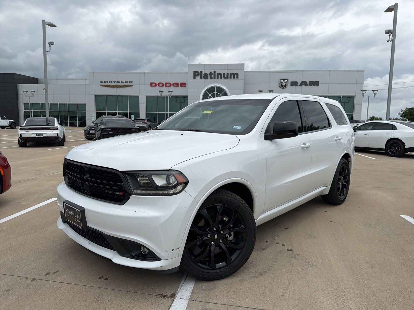 2020 Dodge Durango SXT Plus RWD in White Knuckle Clearcoat — front three-quarter view