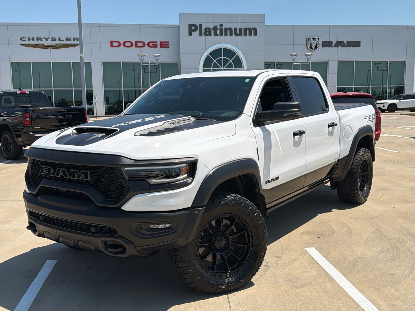 2024 RAM Ram 1500 TRX in Bright White Clearcoat — front three-quarter view