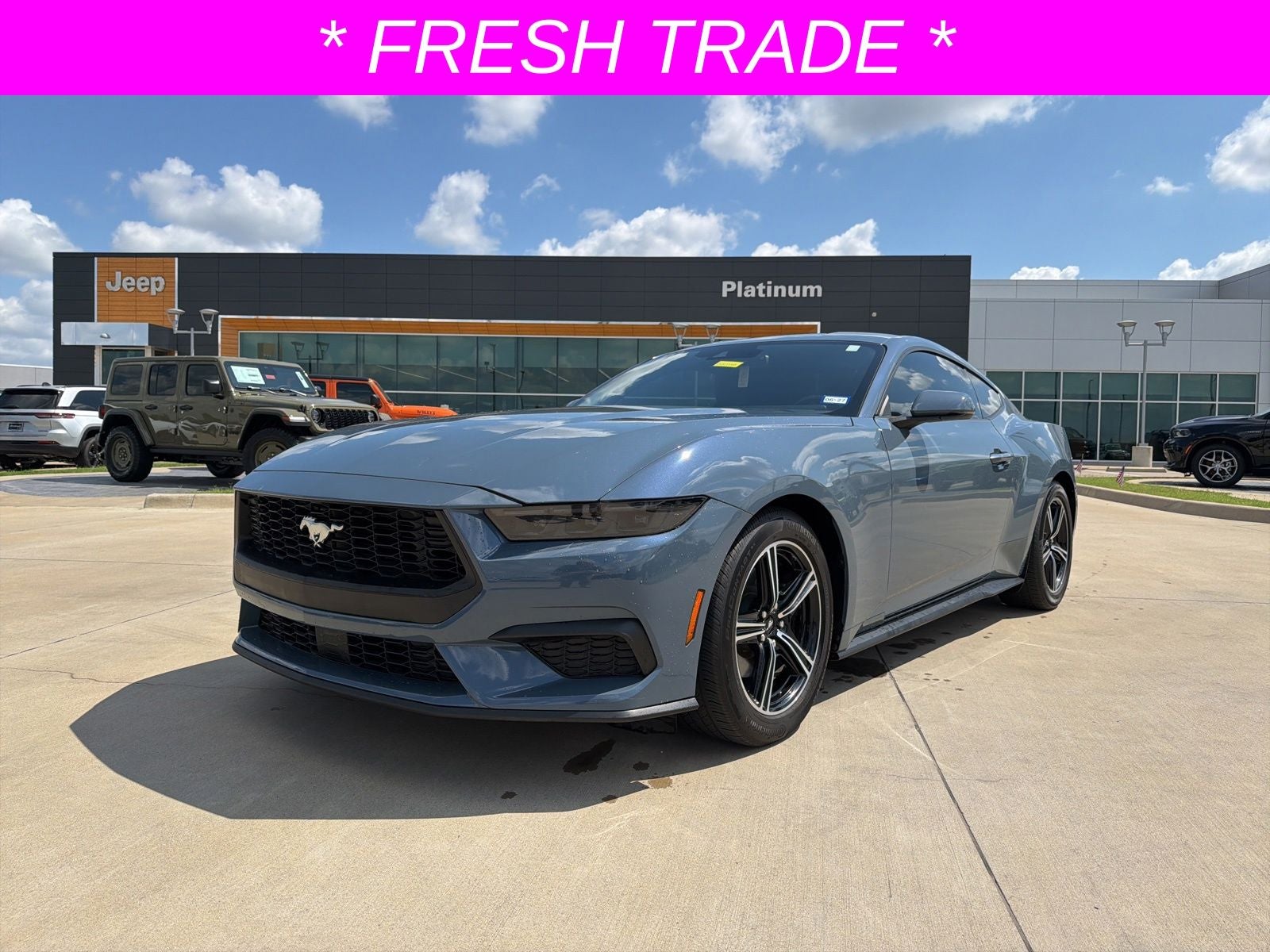 2025 Ford Mustang EcoBoost Premium Fastback in Vapor Blue — front three-quarter view