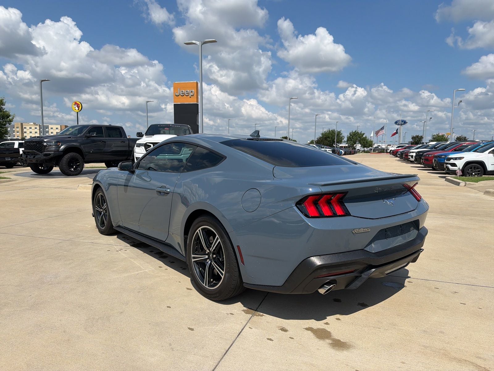 2025 Ford Mustang — rear three-quarter view