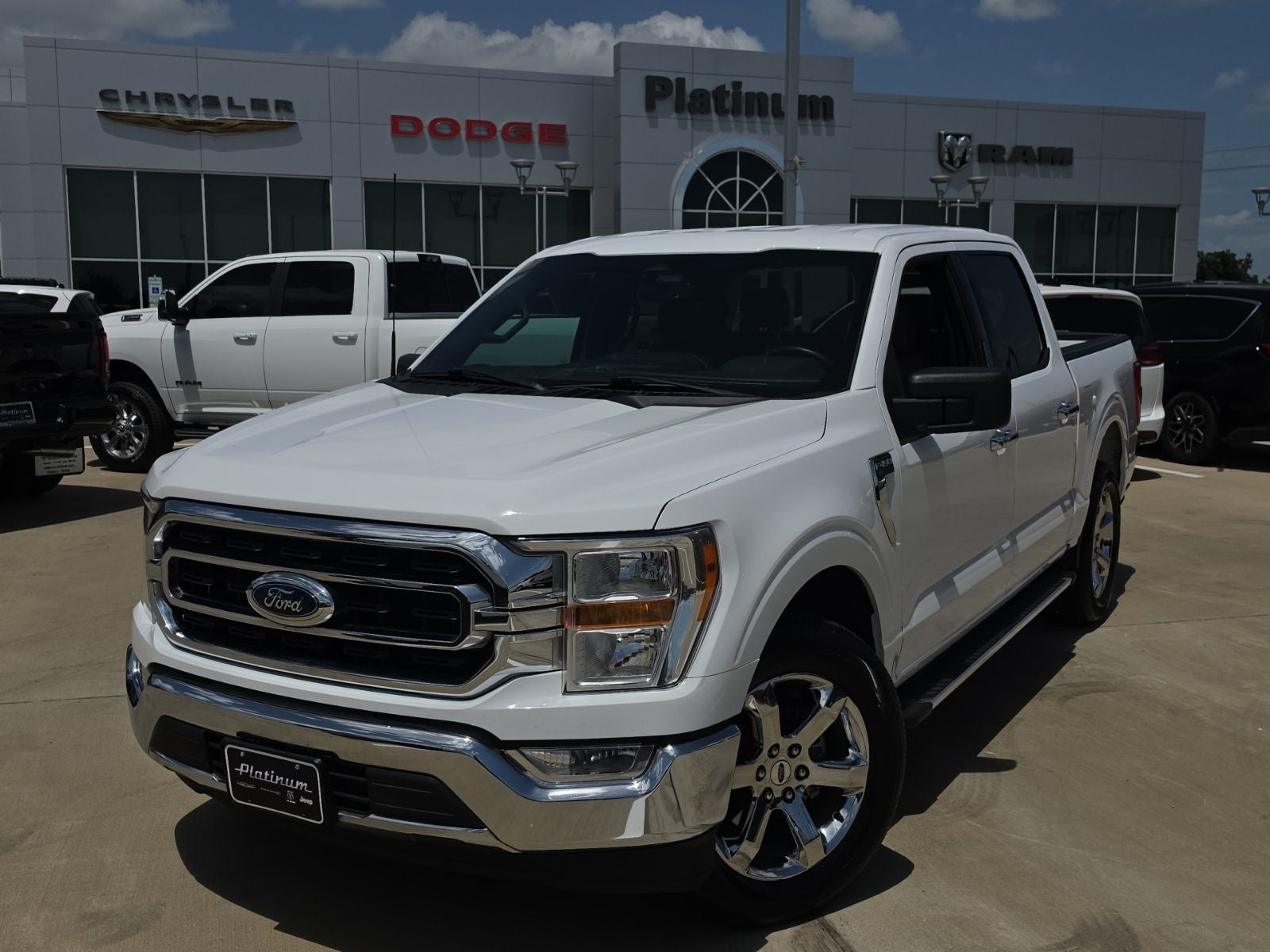 2022 Ford F-150 XLT in Oxford White — front three-quarter view