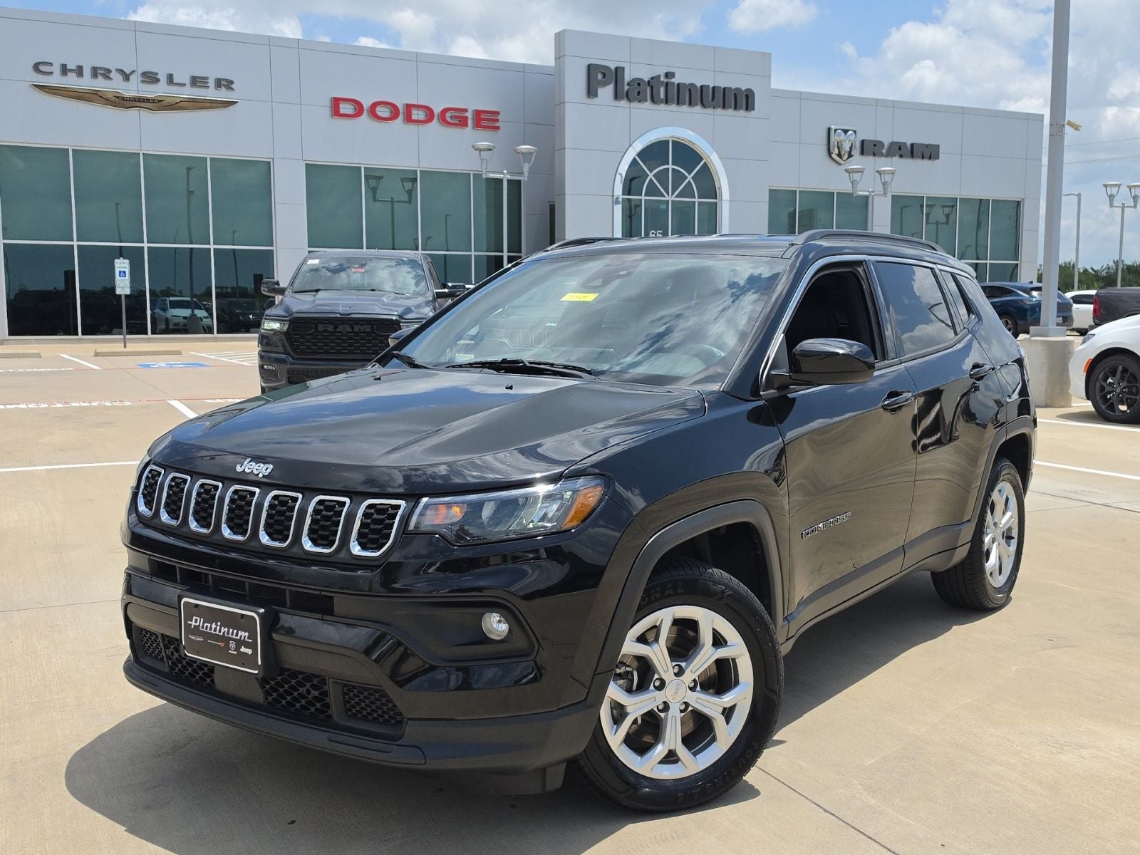 2024 Jeep Compass Latitude 4x4 in Diamond Black Crystal Pearlcoat — front three-quarter view