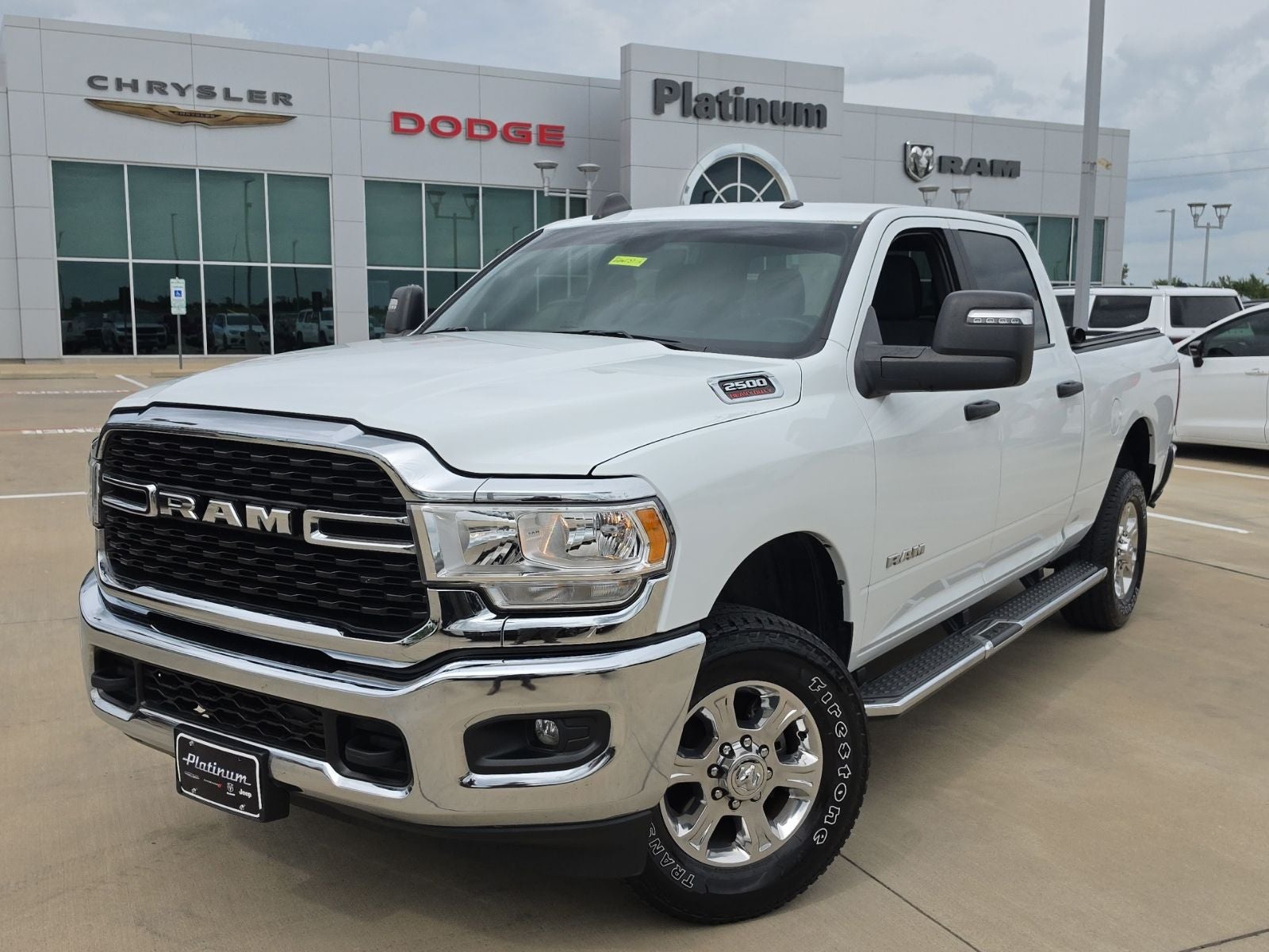 2024 RAM Ram 2500 Big Horn Crew Cab 4x4 6'4' Box in Bright White Clearcoat — front three-quarter view