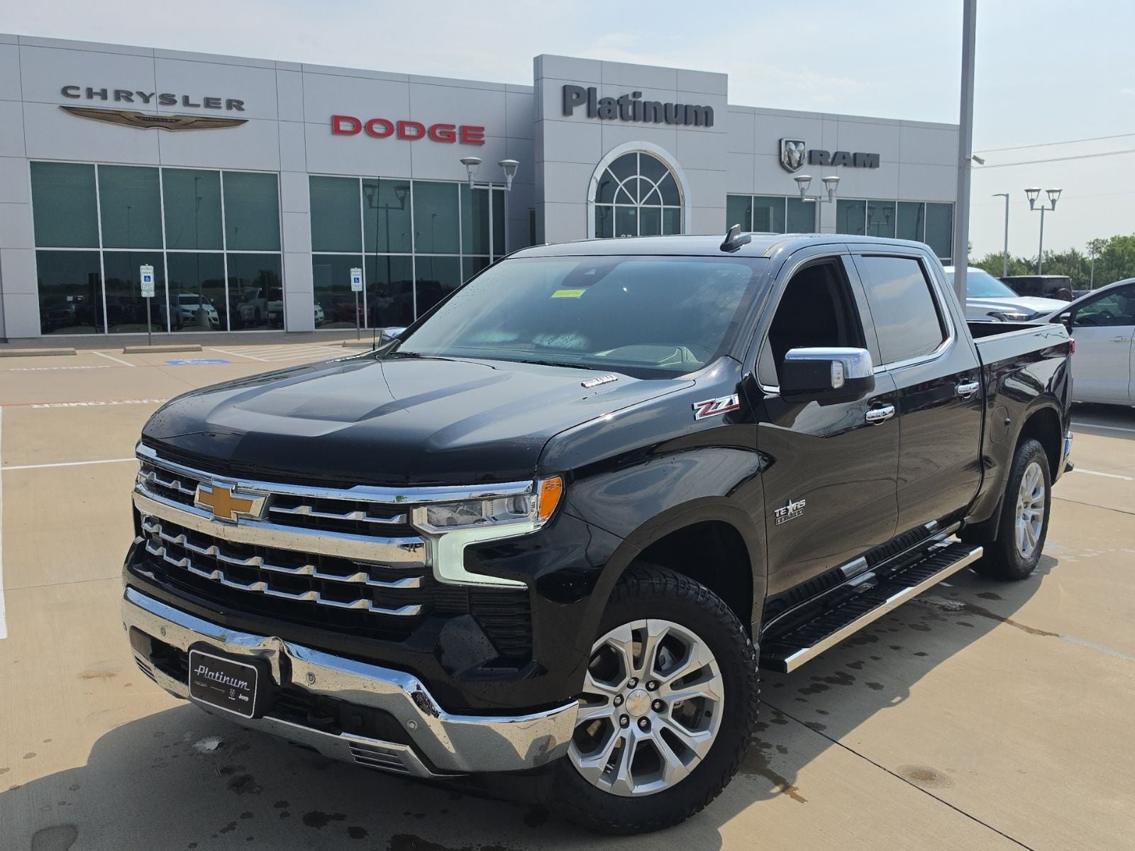 2023 Chevrolet Silverado 1500 4WD Crew Cab Short Bed LTZ in Black — front three-quarter view