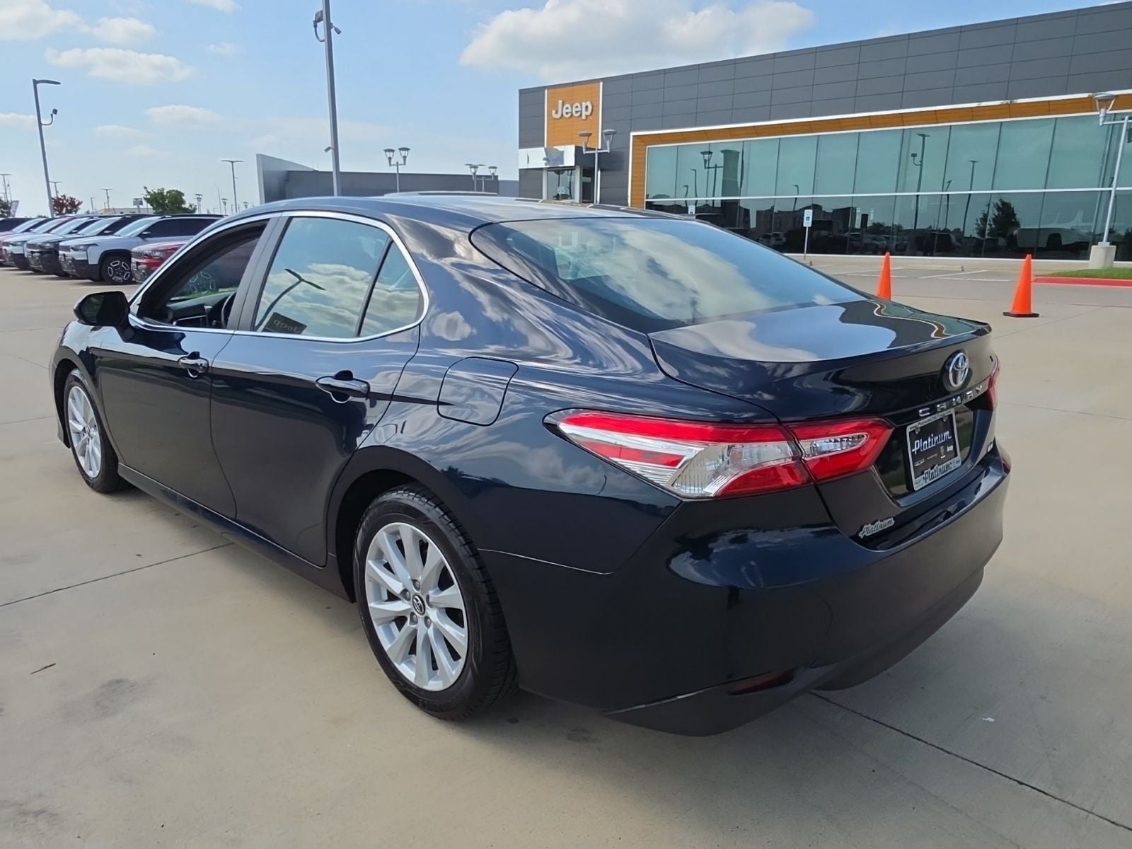 2018 Toyota Camry — rear three-quarter view