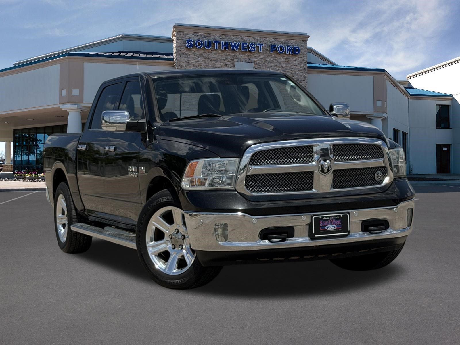 2018 RAM 1500 Lone Star Silver in Brilliant Black Crystal Pearlcoat — front three-quarter view