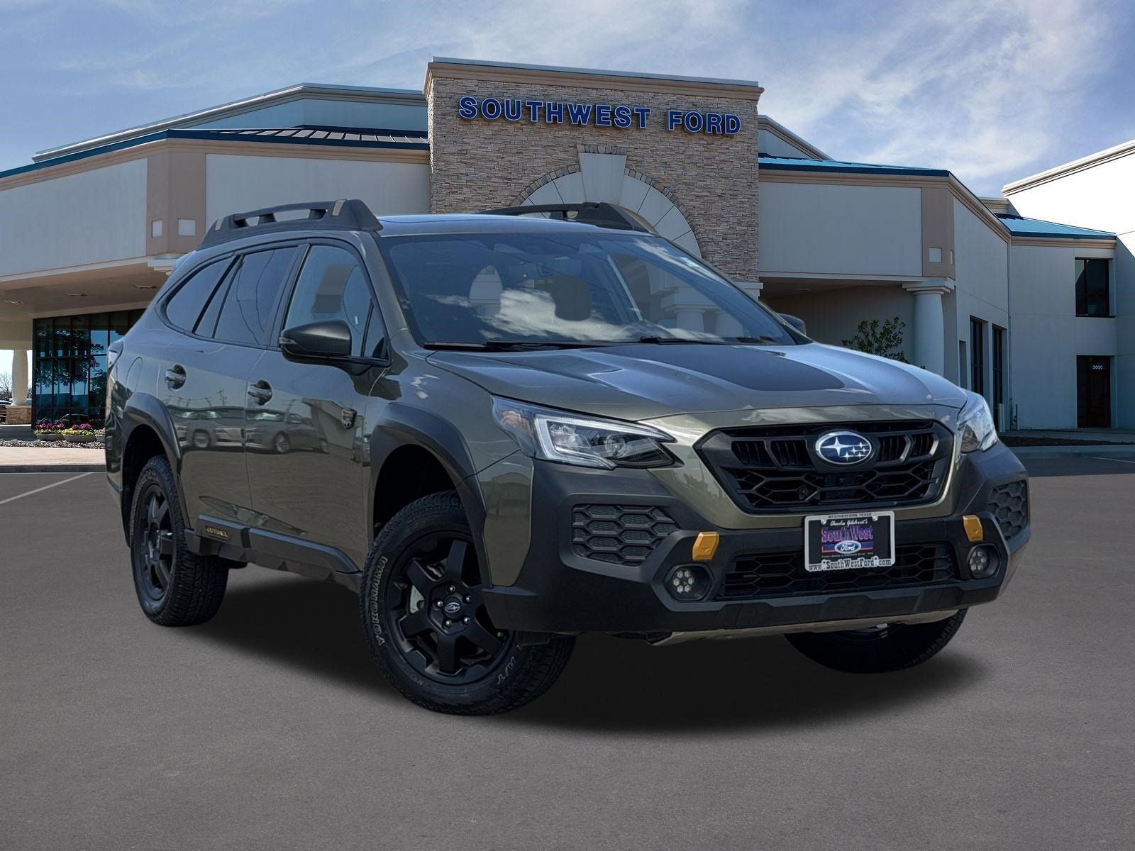 2024 Subaru Outback Wilderness in Autumn Green Metallic — front three-quarter view
