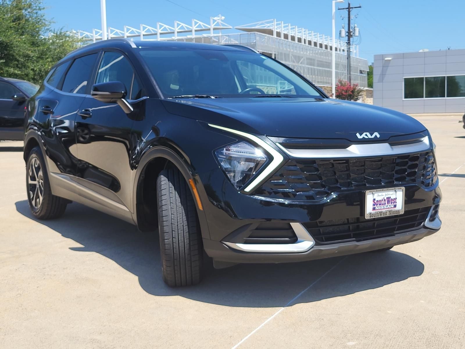 2023 Kia Sportage — rear three-quarter view