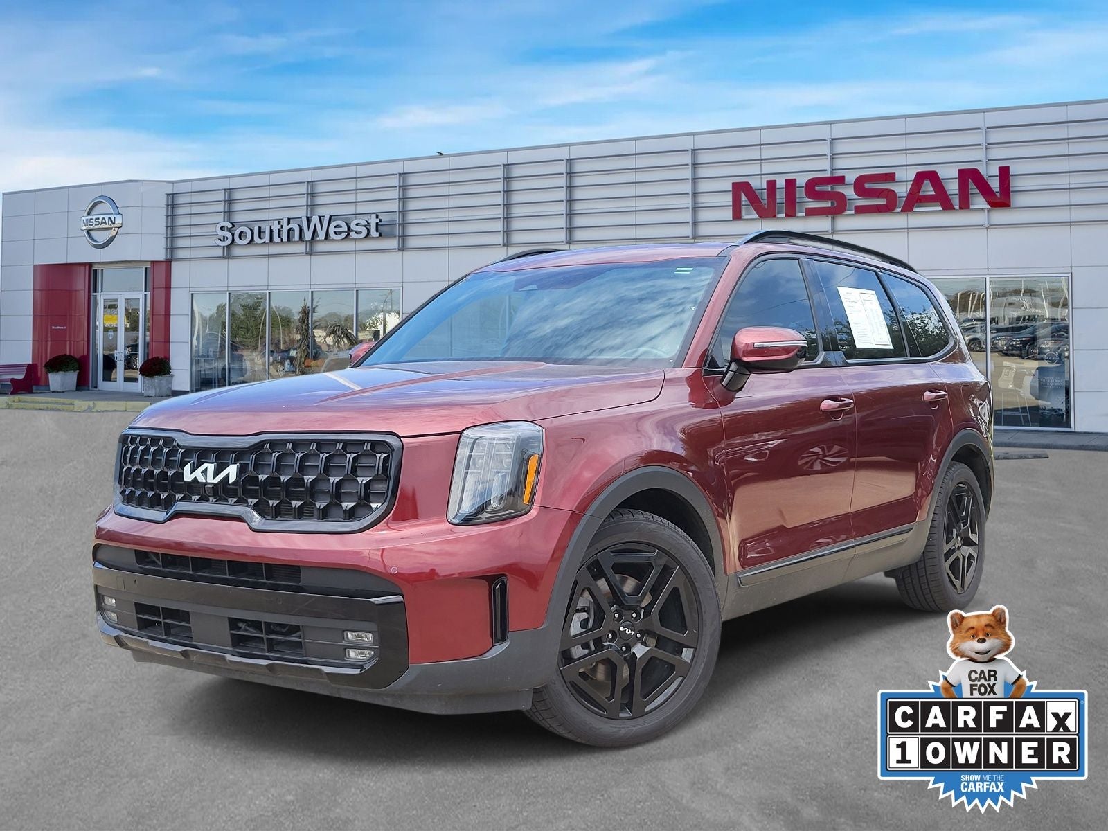 2024 Kia Telluride SX-Prestige X-Line in Dawning Red — front three-quarter view