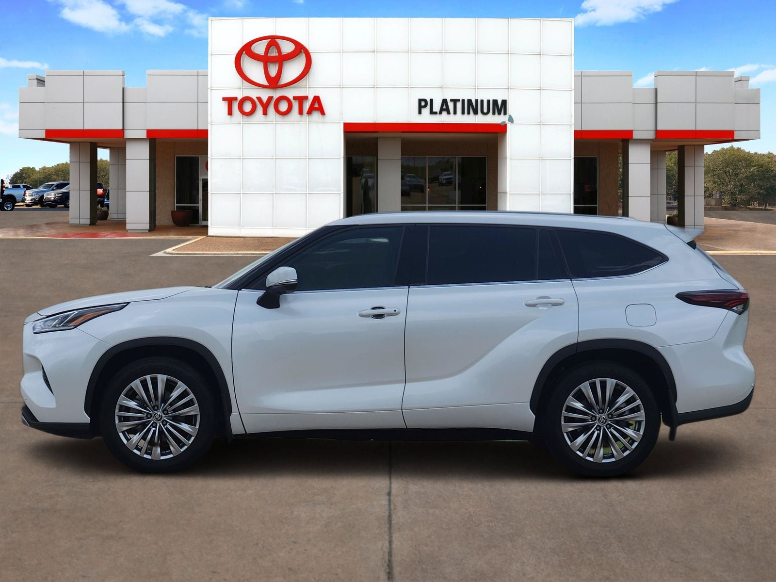 2025 Toyota Highlander — rear three-quarter view