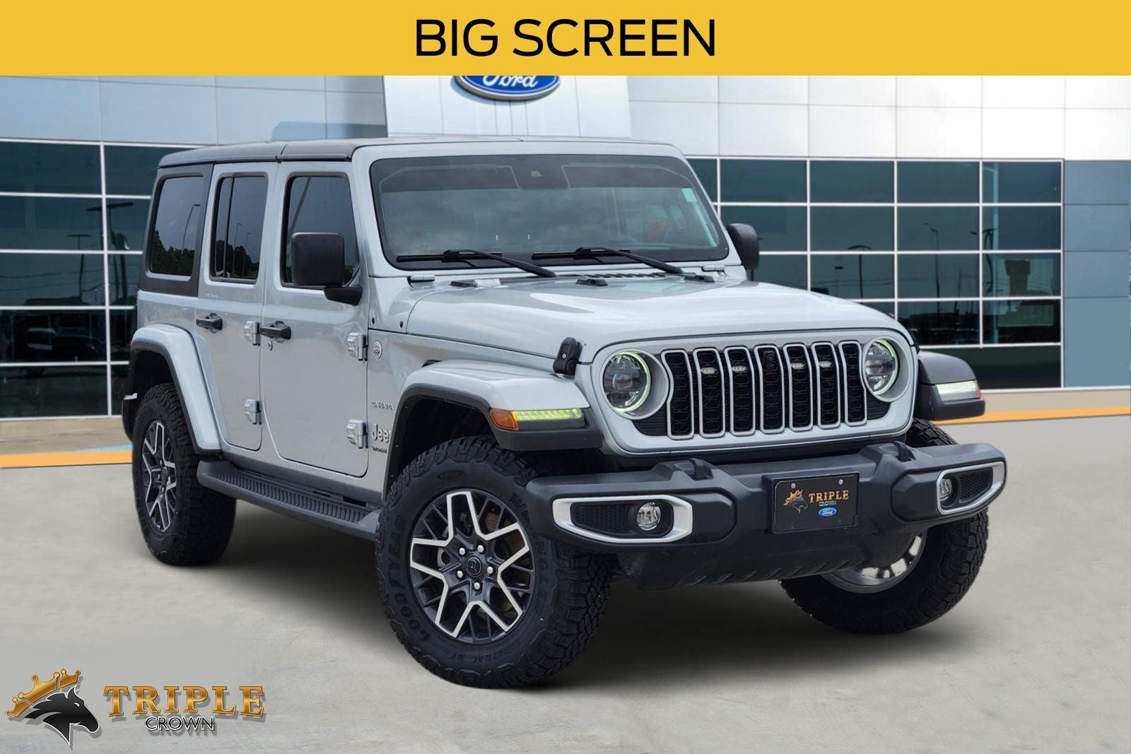 2024 Jeep Wrangler Sahara in Silver Zynith Clearcoat — front three-quarter view