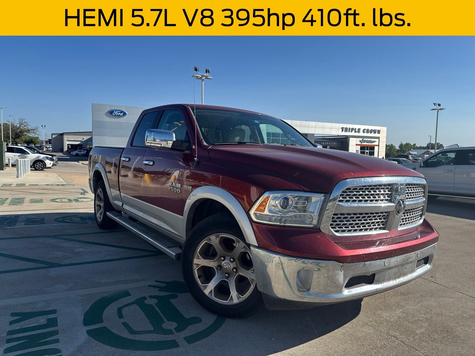 2015 RAM 1500 Laramie in Deep Cherry Red Crystal Pearlcoat — front three-quarter view