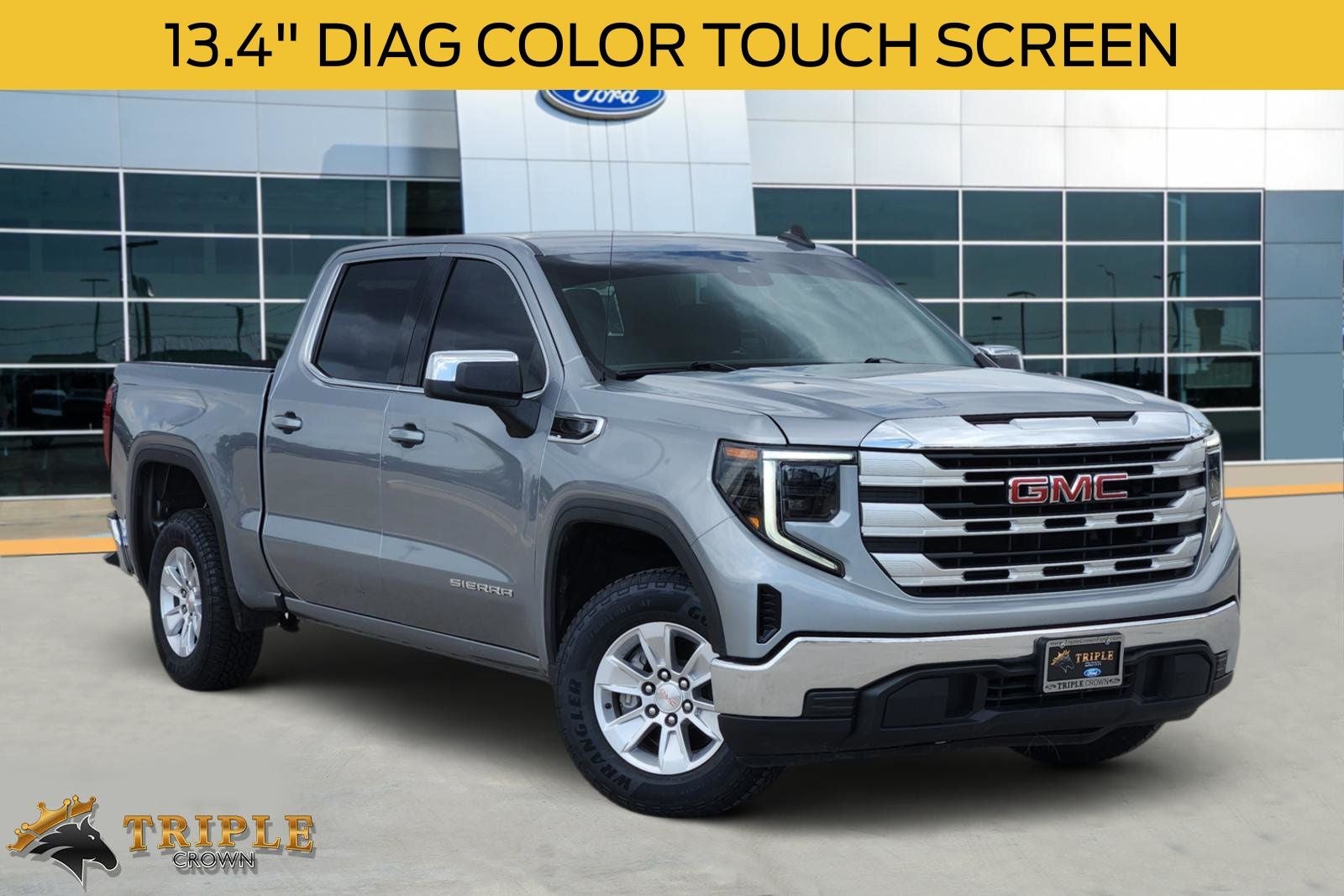 2024 GMC Sierra 1500 SLE in Sterling Metallic — front three-quarter view