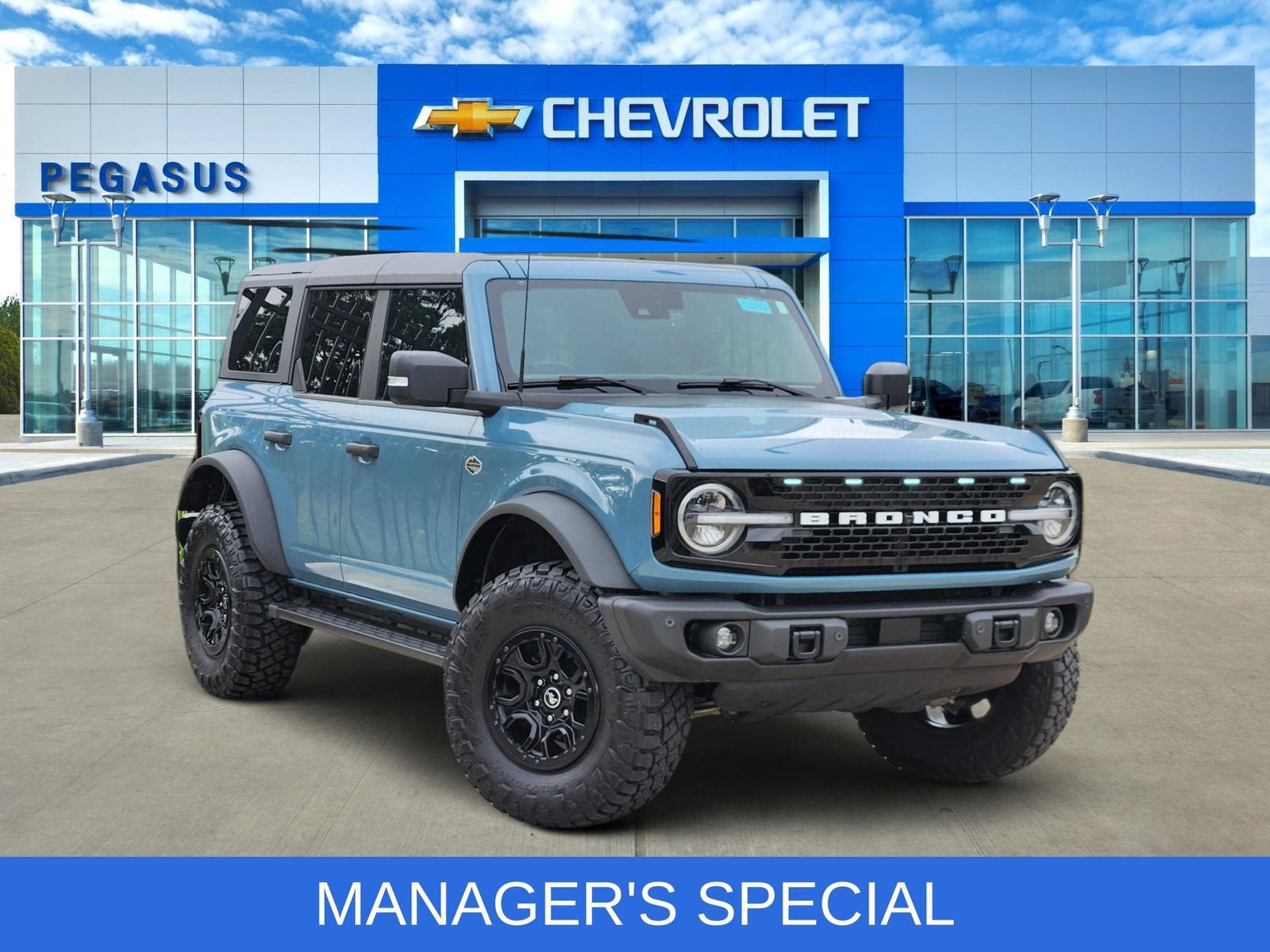 2023 Ford Bronco Wildtrak in Blue — front three-quarter view