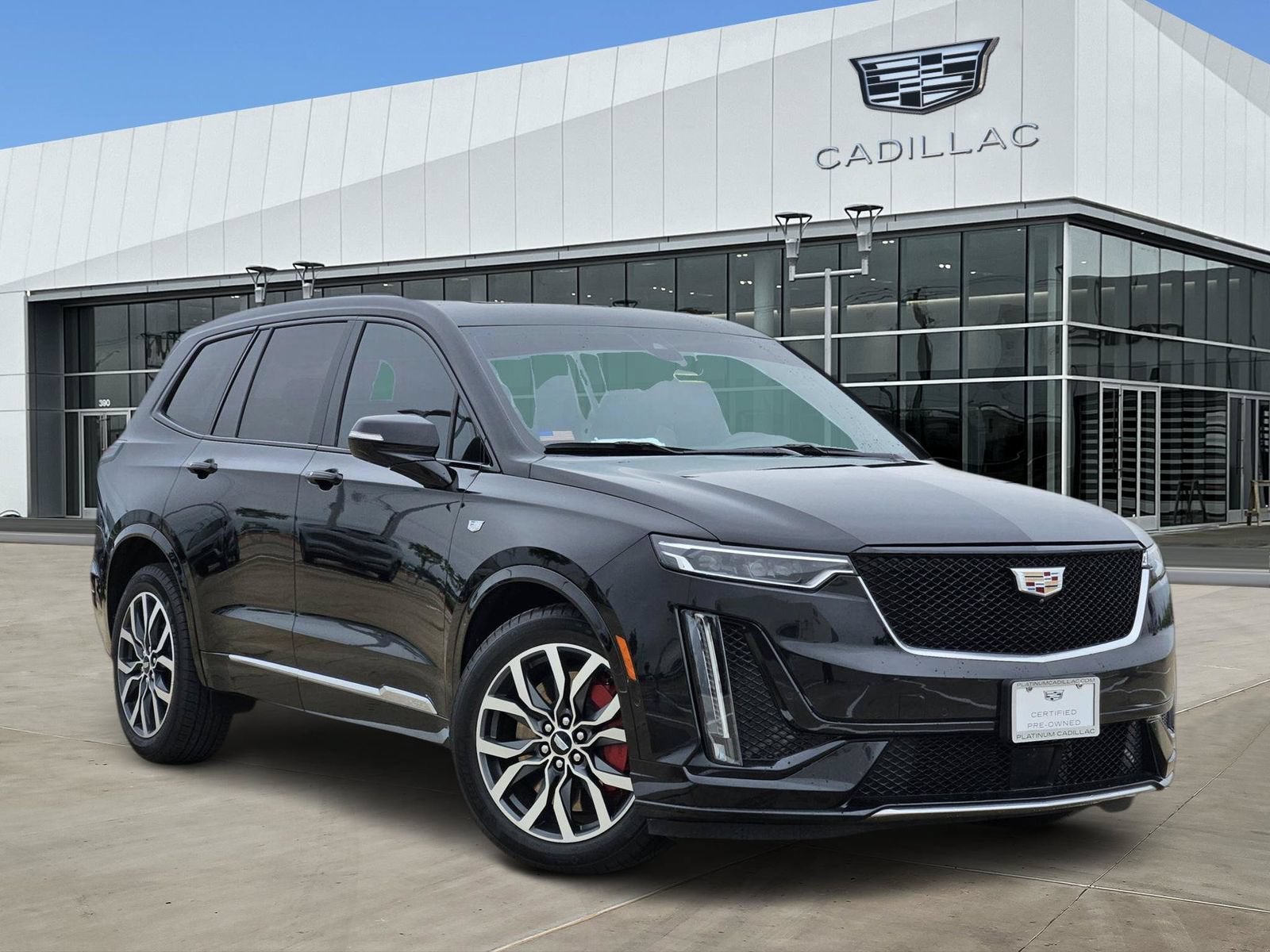 2023 Cadillac XT6 Sport in Stellar Black Metallic — front three-quarter view