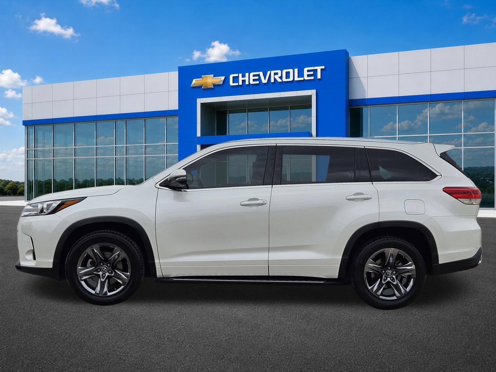 2019 Toyota Highlander — rear three-quarter view
