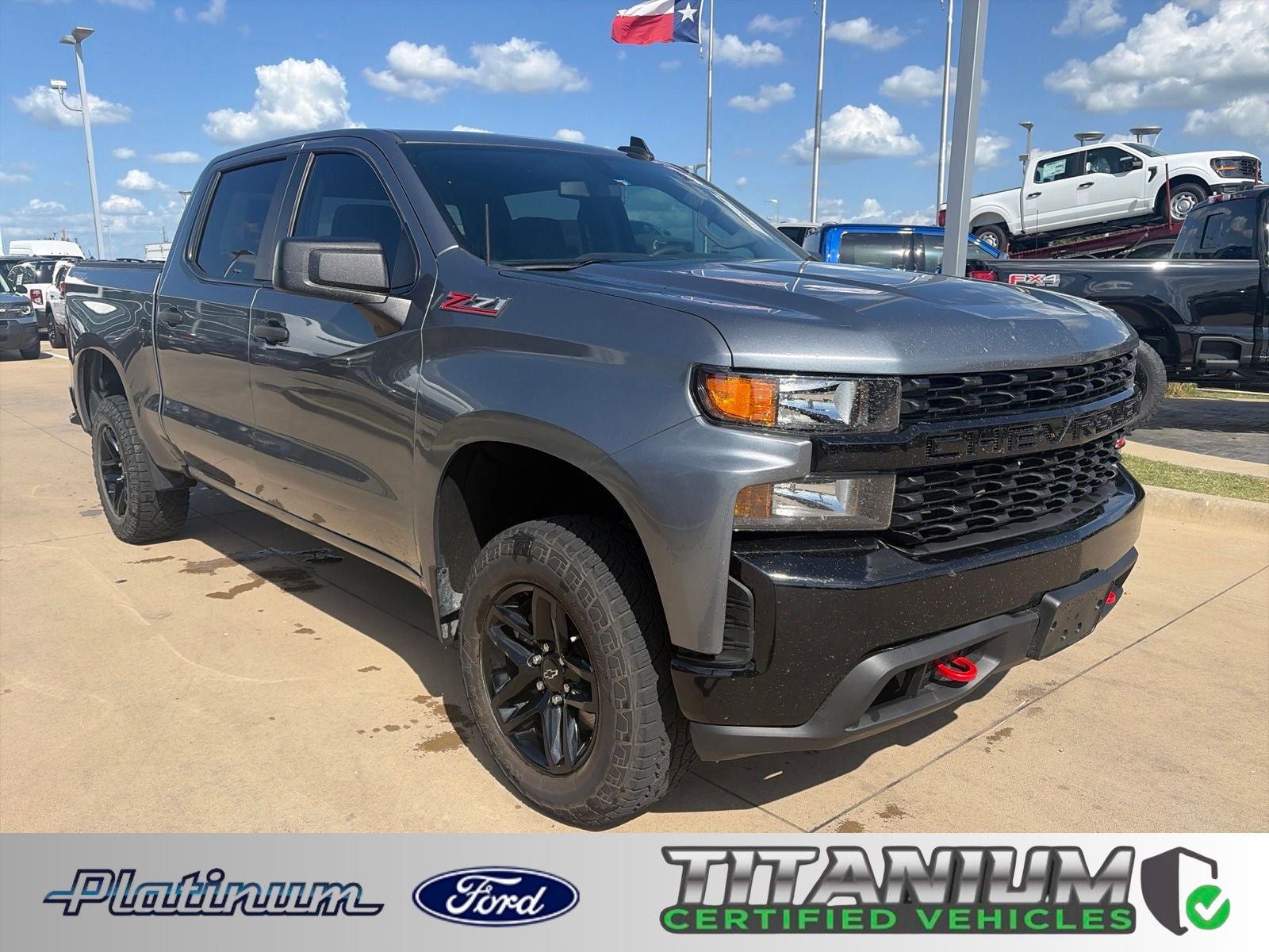 2021 Chevrolet Silverado 1500 Custom Trail Boss in Satin Steel Metallic — front three-quarter view